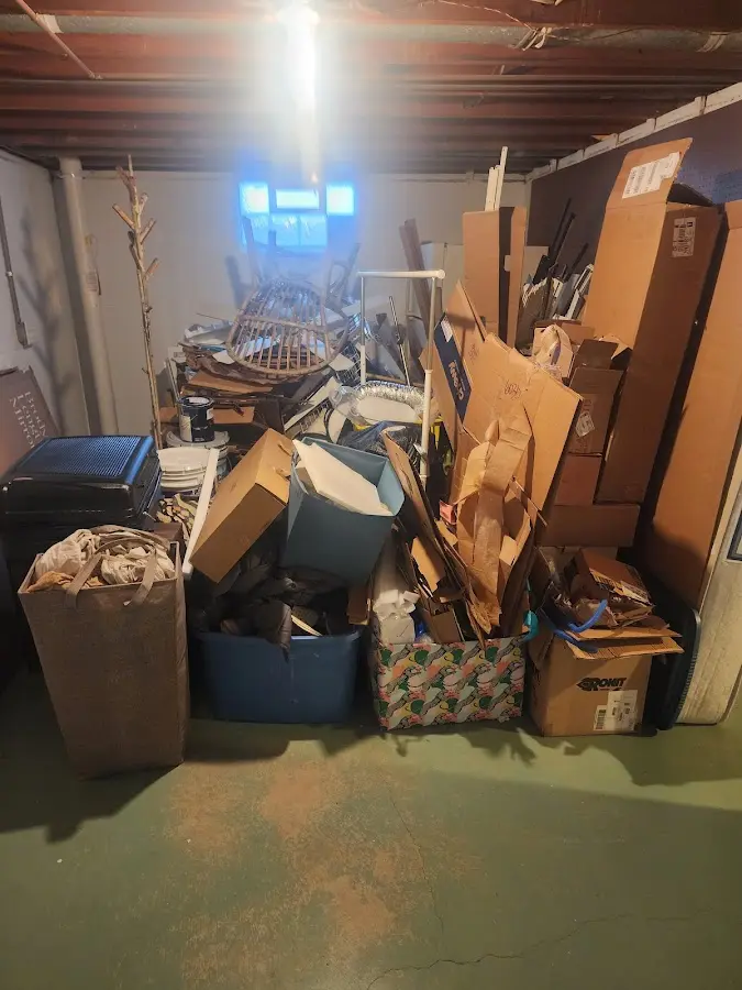 Roll-off dumpster container at job site for 15 Yard Dumpster Rental in Bloomfield